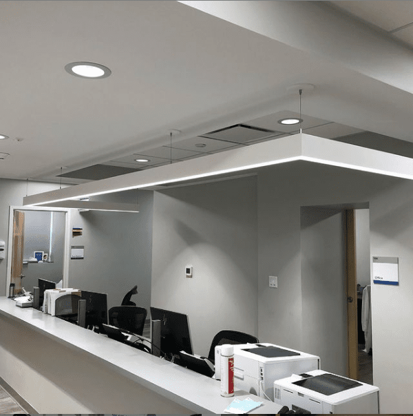 Completed clinical work station with recessed lighting, soffit, and equipment power